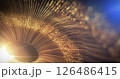 Abstract eye in space with golden light particles on blue background 126486415