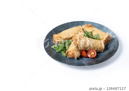 Crispy Spring Rolls on Ceramic Plate isolated on white background Crispy Spring Rolls on Ceramic Plate isolated on white background 126487127