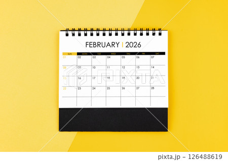 February desk calendar for 2026 year on yellow background for schedule to make appointment. 126488619