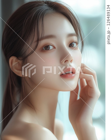 Portrait of a young Korean woman in soft natural light with gentle expression and elegant posture Portrait of a young Korean woman in soft natural light with gentle expression and elegant posture 126489134