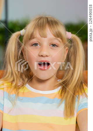 Excited girl child kid surprised, shocked by sudden victory good win news, celebrating, wow reaction 126490858
