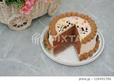 Delicious Birthday Cake with Cherries and Chocolate Decoration Delicious Birthday Cake with Cherries and Chocolate Decoration 126491766