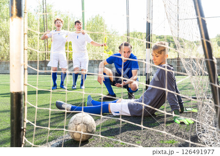 Junior foorball team scored goal Junior foorball team scored goal 126491977