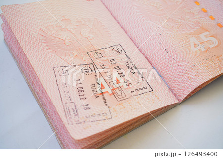 The real page of the foreign passport of citizen of Russian Federation, , migration law, foreign travel, obtaining visa, passport control at border The real page of the foreign passport of citizen of Russian Federation, , migration law, foreign travel, obtaining visa, passport control at border 126493400