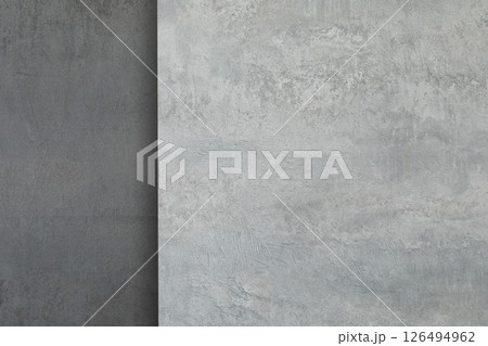 Art shabby composite background of dark-grey and light grey plastered wall, copy space. 126494962