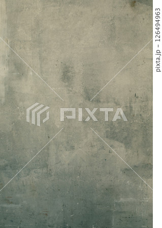 Art background of shabby greenish grey plastered wall, copy space, vertical image. Art background of shabby greenish grey plastered wall, copy space, vertical image. 126494963