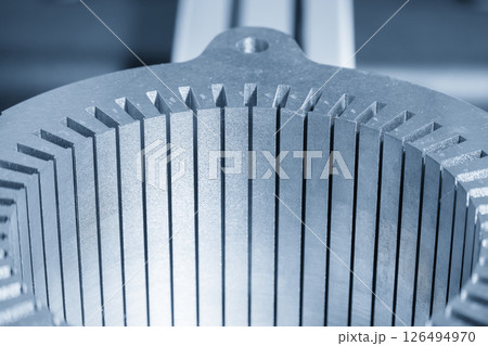 Close up scene the electric vehicle stator parts in the light blue scene. Close up scene the electric vehicle stator parts in the light blue scene. 126494970
