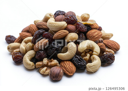 A pile of nuts and raisins on a white background 126495306