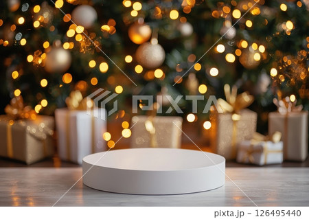 A white box with a white base and a white top sits on a wooden table 126495440