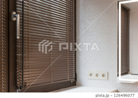 Wooden 25mm Bathroom Blinds with Modern Mirror and Textured Wall 126496077