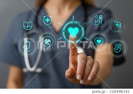 Healthcare Professional Interacting with Digital Technology for Patient Engagement and Monitoring 126496142