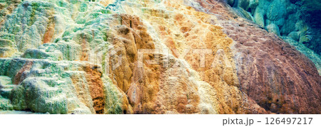 Colorful rock. Thermal springs San Filippo in Tuscany Italy. Nature background. Horizontal banner 126497217