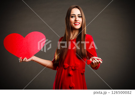 Valentines Day woman holding heart. Valentines Day woman holding heart. 126500082