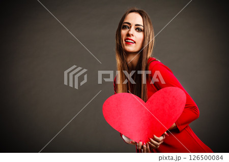 Valentines Day woman holding heart. Valentines Day woman holding heart. 126500084