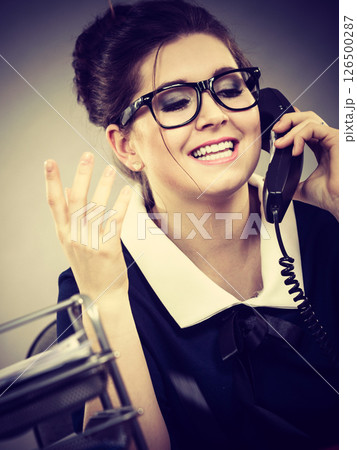 Happy secretary business woman in office Happy secretary business woman in office 126500287