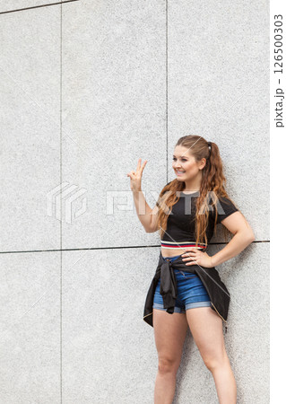 Young woman riding roller skates Young woman riding roller skates 126500303