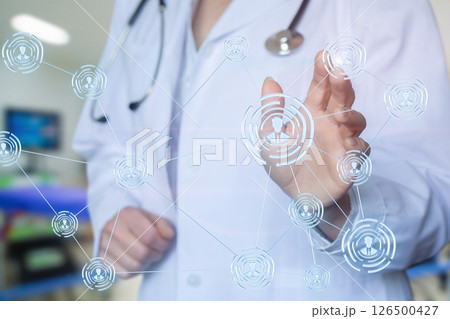 Doctor interacts with virtual medical network Doctor interacts with virtual medical network 126500427