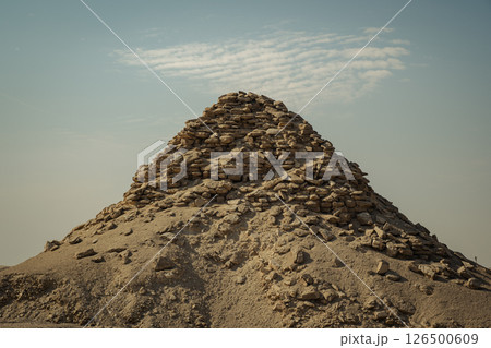 The pyramid of Djoser. Step Pyramid of Djoser and The pyramid complex of Userkaf in the Sahara desert in the Egypt The pyramid of Djoser. Step Pyramid of Djoser and The pyramid complex of Userkaf in the Sahara desert in the Egypt 126500609