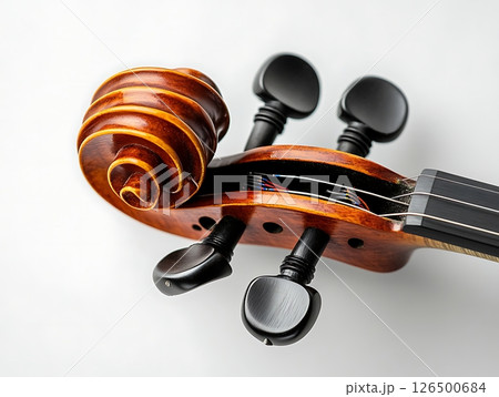Violin Scroll Close-Up with Strings and Elegant Details 126500684