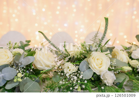wedding table with exclusive floral arrangement prepared for reception, wedding or event centerpiece in greenery style wedding table with exclusive floral arrangement prepared for reception, wedding or event centerpiece in greenery style 126501009