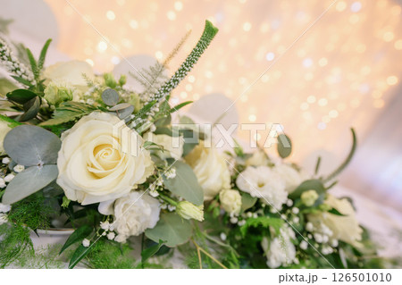 wedding table with exclusive floral arrangement prepared for reception, wedding or event centerpiece in greenery style wedding table with exclusive floral arrangement prepared for reception, wedding or event centerpiece in greenery style 126501010
