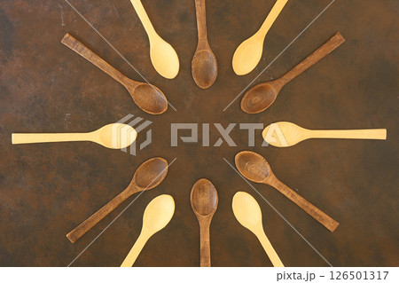 old empty spoons on wooden background old empty spoons on wooden background 126501317