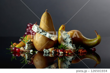 Blue cheese with pear, walnuts, red grapes, and rosemary. 126501934
