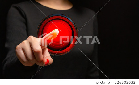 赤いタッチセンサーに触れる女性の指先 ／ テクノロジーと未来感を演出するビジュアル 126502632