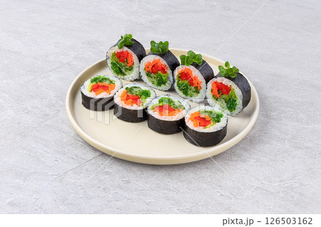 Colorful Vegan Maki Roll with Seaweed Salad and Microgreens 126503162