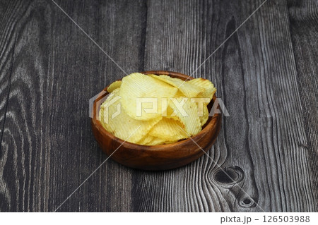 potato chip isolated on white background close up 126503988