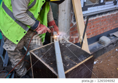 Welding Sparks Are Flying High as Metalwork Beautifully Takes Shape in the Workshop Welding Sparks Are Flying High as Metalwork Beautifully Takes Shape in the Workshop 126504092