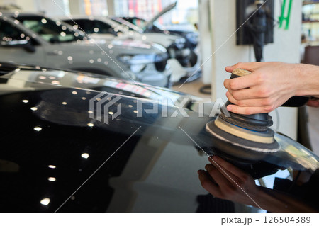 A Detailed Close Up of the Car Polishing Process in the Field of Automotive Detailing 126504389