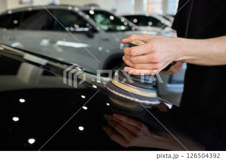 A Detailed Close Up of the Car Polishing Process in the Field of Automotive Detailing 126504392