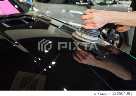 A Detailed Close Up of the Car Polishing Process in the Field of Automotive Detailing A Detailed Close Up of the Car Polishing Process in the Field of Automotive Detailing 126504393