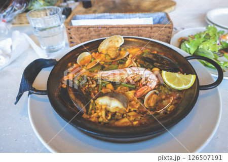 Traditional Paella Dish with Seafood and Fresh Ingredients Traditional Paella Dish with Seafood and Fresh Ingredients 126507191