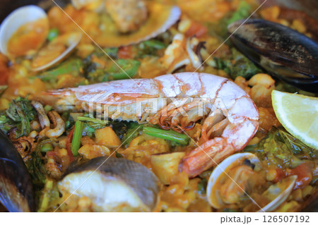 Traditional Paella Dish with Seafood and Fresh Ingredients Traditional Paella Dish with Seafood and Fresh Ingredients 126507192