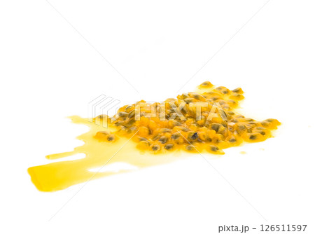 Closeup passion fruit seed on white background, fruit for healthy concept Closeup passion fruit seed on white background, fruit for healthy concept 126511597
