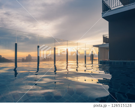 Stunning sunset view from a pool overlooking a city skyline with skyscrapers and mountains at dusk Stunning sunset view from a pool overlooking a city skyline with skyscrapers and mountains at dusk 126515128