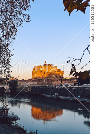 Rome in morning. Panoramic view of Castel Sant'Angelo with reflection in Tiber river in Rome, Italy. Vertical photo 126515583