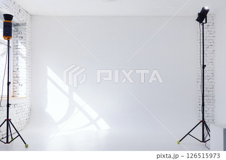 Clear white cyclorama. Light background with with professional lighting equipment. Plain wall empty photo studio Clear white cyclorama. Light background with with professional lighting equipment. Plain wall empty photo studio 126515973