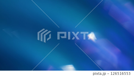 Blur light flare. Shiny radiance. Gleaming particles lens flare on abstract purple blue glow abstract background. 126516553