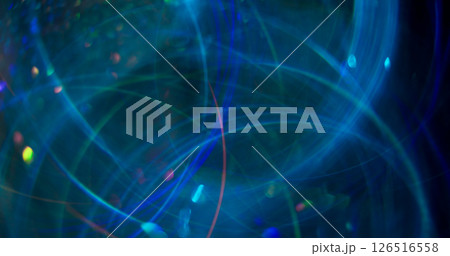 Colorful circles. Blurred festive flare. Blue optical kaleidoscope on abstract sparkling bokeh light background. 126516558