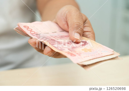 Asian woman counting Thai baht banknote money, investment economy, accounting business and banking. 126520698