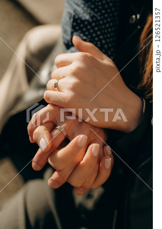 Close-Up of Tender Hands Holding with Rings Close-Up of Tender Hands Holding with Rings 126521357