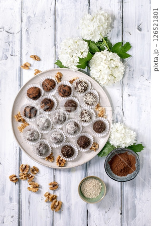 Homemade raw vegan balls Truffles With White Flowers 126521801