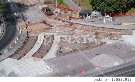 Road construction site with tram tracks repair and maintenance aerial timelapse. 126521912