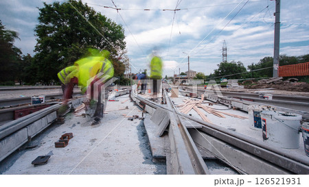 Road construction site with tram tracks repair and maintenance timelapse hyperlapse. Road construction site with tram tracks repair and maintenance timelapse hyperlapse. 126521931