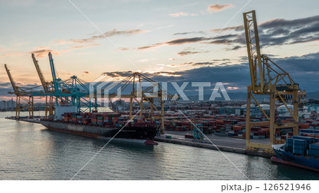 Aerial view of the sea cargo port and container terminal of Barcelona timelapse, Barcelona, Catalonia, Spain. 126521946