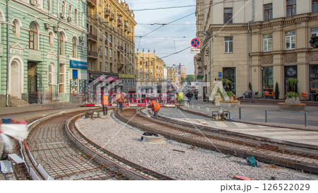 Workers with protective mask welding reinforcement for tram tracks in the city timelapse 126522029