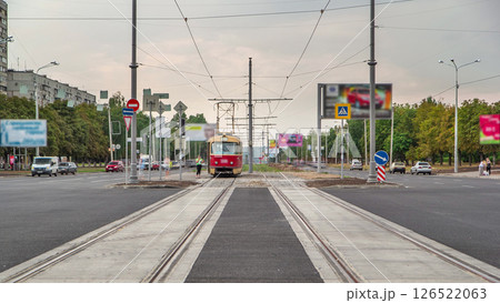 View with a new asphalt road under construction. View with a new asphalt road under construction. 126522063